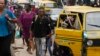 People walk during rush hours in Lagos, Nigeria, Nov. 14, 2022. The world's population hit an estimated 8 billion on Nov. 15, 2022, according to the United Nations Population Fund.