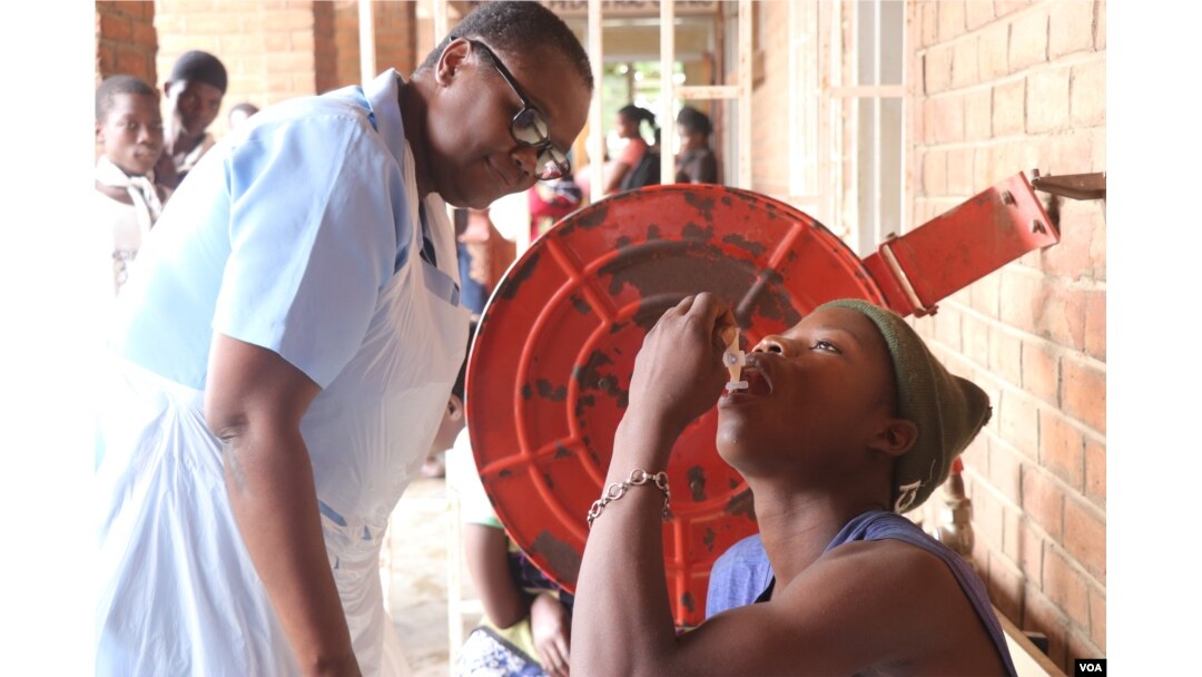 Medical workers in Malawi say cholera vaccine intake has been slow because many people fear it will cause infertility. (Lameck Masina/VOA)