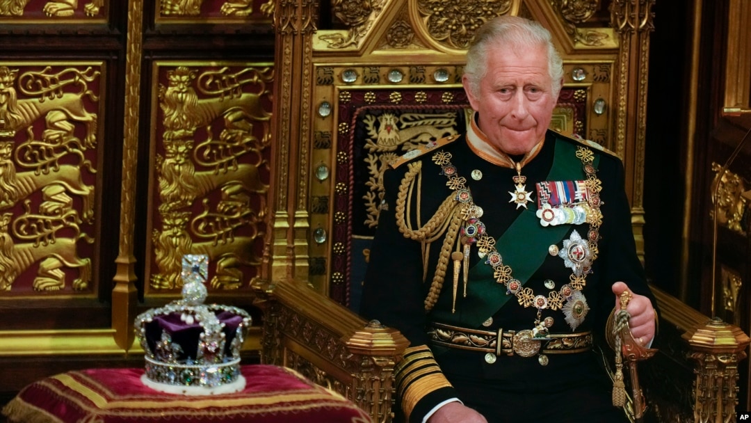 FILE - Prince Charles is seated next to the Queen's crown during the State Opening of Parliament, at the Palace of Westminster in London, May 10, 2022.