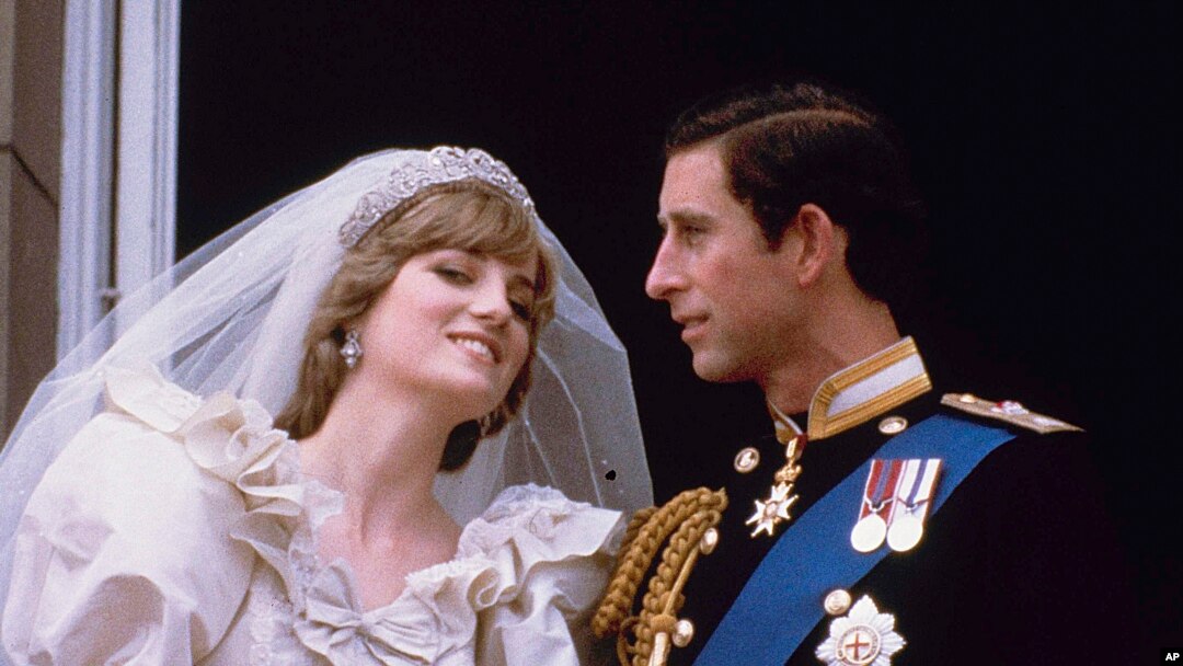 FILE - Britain's Prince Charles and his bride Diana, Princess of Wales, are shown on their wedding day on the balcony of Buckingham Palace in London, July 29, 1981.