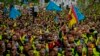 FILE - Truck drivers protest the high price of fuel in Madrid, Spain, on March 25, 2022. 