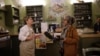 National Public Radio correspondent Sylvia Poggioli interviews chef Tiziana Tacchi at her restaurant, Il Grillo e Buoncantore, in the Tuscan town of Chiusi in November 2022. (Valerio Muscella photo) 