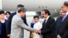 This handout photo taken July 30, 2023, and released by the Pakistan Information Department (PID) shows Pakistan's Interior Minister Rana Sanaullah (2nd R) receiving visiting Chinese Vice Premier He Lifeng (2L) upon his arrival in Islamabad.