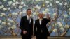 California Governor Gavin Newsom, left, stands next to Beijing Party Secretary Yin Li during a meeting in Beijing, Oct. 26, 2023. Newsom was on a weeklong tour of China.