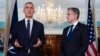 Secretary of State Antony Blinken, right, looks to NATO Secretary General Jens Stoltenberg as the speaks at the State Department in Washington, June 13, 2023.