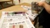 FILE- This Aug. 6, 2019, photo shows The Vindicator newspaper prepared for delivery in Liberty Township near Youngstown, Ohio. The Vindicator, a 150-year-old paper, shut down a few weeks later because of financial struggles.