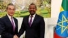 የቻይና ኮሚኒስት ፓርቲ የውጭ ጉዳይ ቢሮ ሓላፊ ዋንግ ዪ፣ ከኢትዮጵያው ጠቅላይ ሚኒስትር ዐቢይ አሕመድ ጋር
