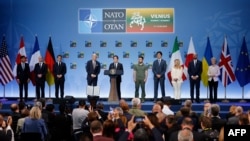 Alongside Zelenskyy, leaders of the Group of Seven wealthiest democracies announce a new framework to provide long-term security and economic support for Ukraine, at the end of the NATO summit in Vilnius, July 12, 2023.