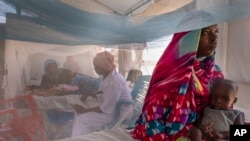 FILE - Sudanese children suffering from malnutrition are treated at an MSF clinic in Chad, April 6, 2024. Many people fled Sudan's western region of Darfur, where attacks by the Arab-dominated Rapid Support Forces on ethnic African civilians have revived memories of genocide.