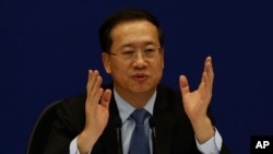 FILE - Ma Zhaoxu, Chinese Deputy Minister of Foreign Affairs, talks during a press briefing at the Chinese Foreign Ministry in Beijing on April 22, 2021