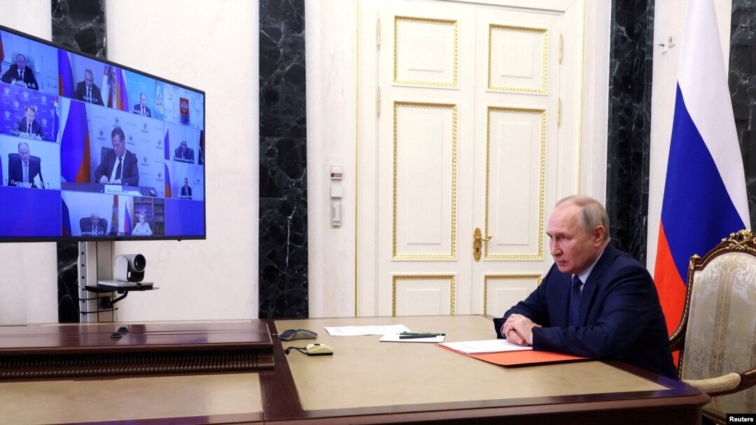 Russian President Vladimir Putin chairs a meeting with members of the Security Council via a video link in Moscow, Russia May 26, 2023.