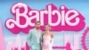 FILE - Ryan Gosling and Margot Robbie pose for photographers upon arrival at the premiere of the film "Barbie" on July 12, 2023, in London. Kuwait banned the movie on Aug. 10, 2023, and Lebanon also is considering banning it. (Scott Garfitt/Invision/AP)