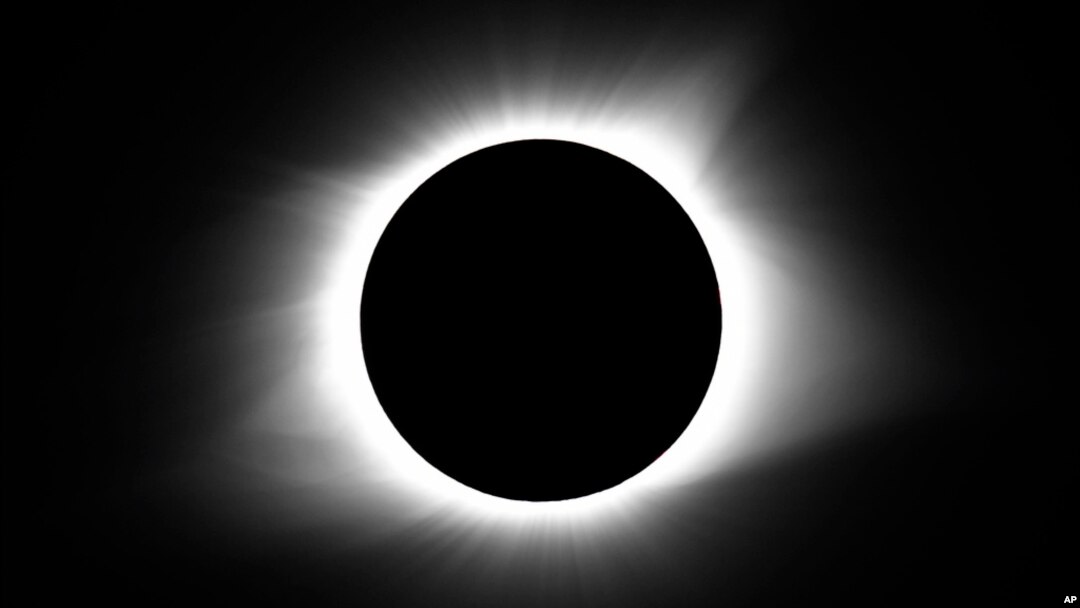 FILE - The moon covers the sun during a total solar eclipse, Aug. 21, 2017, in Cerulean, Kentucky.