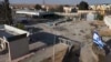 This image taken from footage released by the Israeli army shows an Israeli combat tank entering the Palestinian side of the Rafah border crossing between Gaza and Egypt, southern Gaza Strip, May 7, 2024, as part of Israel taking "operational control" of the crossing.