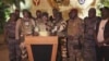 Pot pawol solda rebel yo pran la pawol nan televizyon nasyonal pou anonse yo sezi pouvwa a nan Libreville, Gabon, 30 Out 2023. 