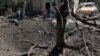 UKRAINE-RUSSIA-CONFLICT-WAR
27/140 characters
Local residents stand next to a crater and a destroyed residential house following a missile strike in Kyiv region, on Aug. 27, 2023, amid the Russian invasion of Ukraine. 