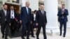 Russian President Vladimir Putin, center right, and Turkish President Recep Tayyip Erdogan, center left, leave their talks at Russia's Black Sea resort of Sochi, Russia, Sept. 4, 2023. 
