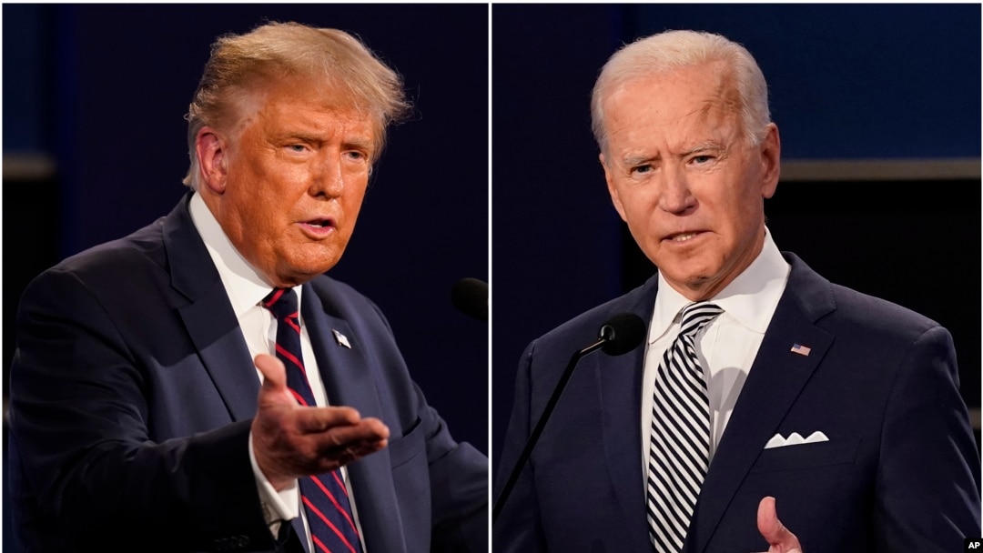 FILE - This combination of Sept. 29, 2020, photos shows President Donald Trump, left, and then-Vice President Joe Biden during the first presidential debate at Case Western University and Cleveland Clinic, in Cleveland, Ohio.