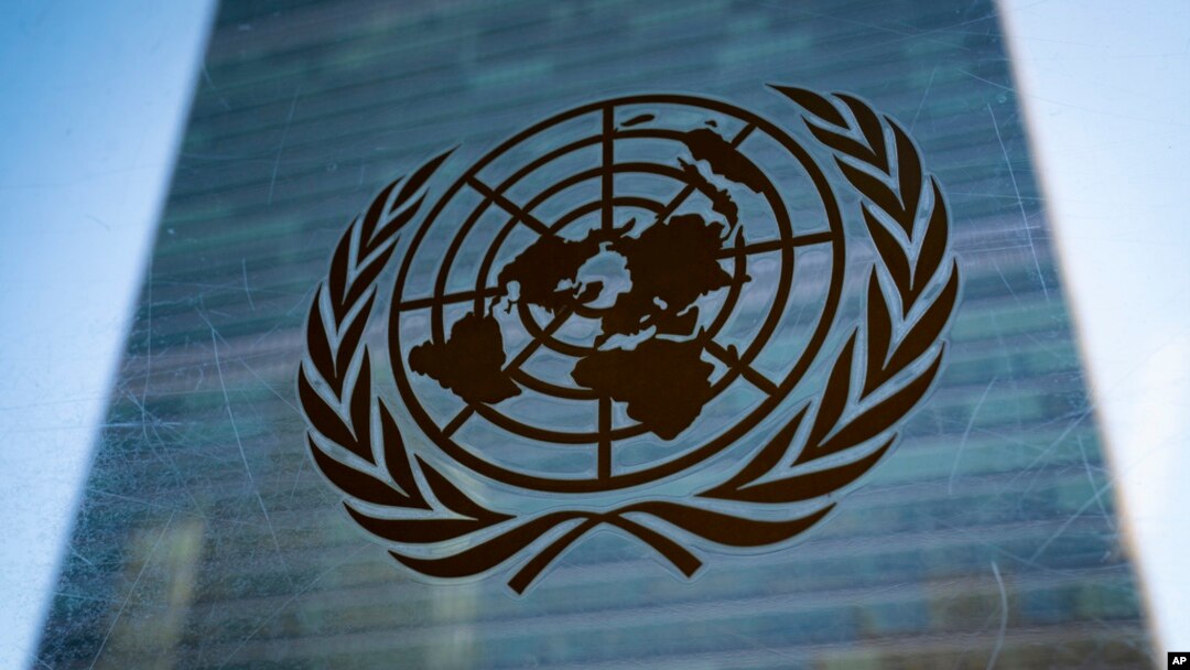 FILE - The symbol of the United Nations is displayed outside the Secretariat Building, Feb. 28, 2022, at U.N. headquarters. The U.N. said April 5, 2023, that it would not comply with a Taliban decree banning Afghan women from working for the organization.