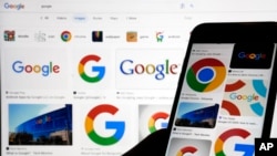 FILE - Google logos pop up in a search in New York, Sept. 11, 2023.