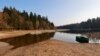 FILE - A boat floats on Pierre-Percee Lake in France, March 1, 2023. France recorded 32 days without rain this winter – the longest winter drought since record-keeping began in 1959.