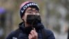 FILE - Simon Cheng, founder of Hongkongers in Britain, attends an event in Leicester Square, central London, on Dec. 12, 2020. 