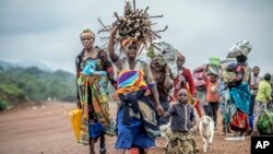 ፎቶ ፋይል - በዴሞክራቲክ ሪፐብሊክ ኮንጎ በተፈጠረ ግጭት ቀዮአቸውን ለቀው የሚሰደዱ 