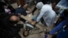 Palestinians wounded in the Israeli bombardment of the Gaza Strip are brought to Al Aqsa hospital in Deir al Balah, Gaza Strip, Jan. 7, 2024.
