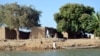 FILE - The village of Blaram on the Logone river is seen during normal water levels, at the Cameroon-Chad border, March 1, 2013. Recent flooding has devastated the region.