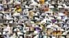 FILE - Guns seized at U.S. airports by the TSA are seen in this collage.