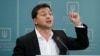 FILE - Ukrainian President Volodymyr Zelenskiy speaks to media during his press conference in Kyiv, Ukraine, Oct. 1, 2019. 