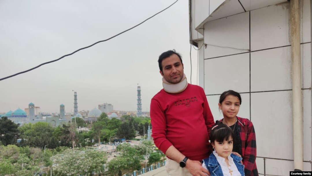 Afghan journalist Abdul Khalil Rasoli, pictured with his family in Herat, Afghanistan, before the Taliban take over. (Family handout)