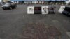 FILE - The words "End Sars," referring to the Special Anti-Robbery Squad police unit, are written near the Lekki toll gate, in Lagos, Nigeria, Oct. 24, 2020. 