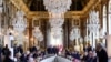 EU leaders get ready to take part in a summit to address the fallout of Russia's invasion of Ukraine at the Palace of Versailles, near Paris, on March 11, 2022. 