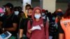 Nigerian students, who studied in Ukraine, arrive at Nnamdi Azikiwe International Airport after fleeing Russia's invasion of the country, in Abuja, Nigeria, March 4, 2022. Nigeria says that 80 of its students remain trapped in the southern city of Kherson.