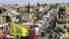 Tankers carrying Iranian fuel arrive at al-Ain in Hermel in east Lebanon's Bekaa Valley on September 16, 2021. Dozens of tankers carrying Iranian fuel and transported by the Shiite Hezbollah movement arrived from Syria in Lebanon. (AFP)