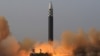북한은 24일 김정은 국무위원장의 명령에 따라 신형 대륙간탄도미사일(ICBM) 화성 17형을 시험 발사했다며 사진을 공개했다.