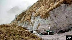 The wreckage of a plane lost in Nepal’s mountains was found scattered on a mountainside on May 30, 2022. Fishtail Air handed out this photograph.