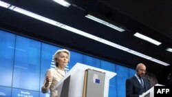 European Council president Charles Michel (R) and Commission president Ursula von der Leyen address the closing press conference of an European Union summit on Ukraine, defense and energy, in Brussels, May 31, 2022.