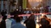 Police and emergency service members work at the scene after an explosion on busy pedestrian Istiklal street in Istanbul, Nov. 13, 2022. 