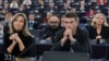 European Parliament members listen to assembly President Roberta Metsola during a special session on lobbying, Dec. 12, 2022 at the European Parliament in Strasbourg, eastern France. 