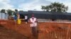 Members of Doctors Without Borders set up an Ebola treatment isolation unit at the Mubende regional referral hospital in Uganda on Sept. 24, 2022. 