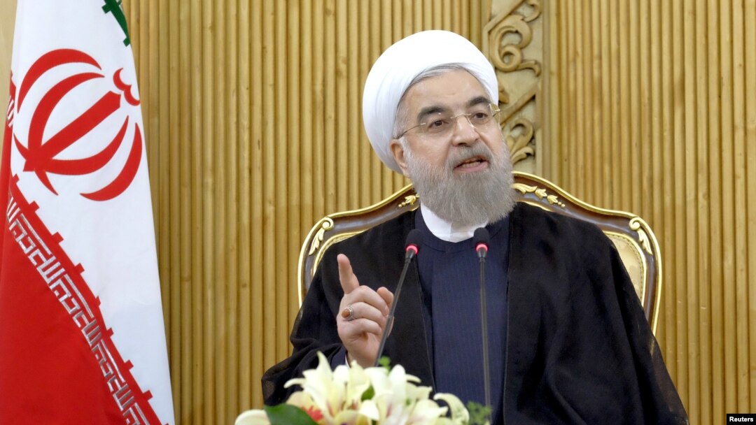 FILE - Iranian President Hassan Rouhani speaks in Tehran. Rouhani ordered his defense minister to expand the ballistic missile program as a response to the threatened U.S. sanctions.