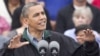 President Barack Obama speaks during a campaign stop in Council Bluffs, Iowa, August 13, 2012.