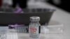 A vial of Moderna COVID-19 vaccine is seen at an ambulance company in Santa Fe Springs, Calif., an. 9, 2021. 