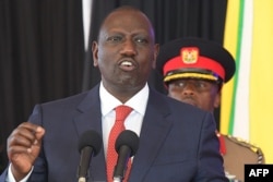 FILE - Kenya's President William Ruto gestures as he speaks at the State House in Nairobi, Oct. 27, 2022.