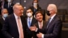 NATO Secretary General Jens Stoltenberg greets U.S. President Joe Biden with an elbow bump prior to a bilateral meeting on the sidelines of a NATO summit at NATO headquarters in Brussels, June 14, 2021. 