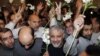 Iranians released by Syrian rebels arrive at a hotel in Damascus, Syria, January 9, 2013. 