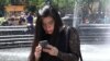China-native Bingqing Zhou says that even though she now has a green card, she still faces significant barriers as an international graduate seeking employment. (R. Taylor/VOA)