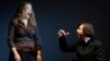 FILE - Conductor Teodor Currentzis, right, accompanies U.S. opera singer Mardi Byers during premiere of Alban Berg opera "Wozzek," Bolshoi theater, Moscow.